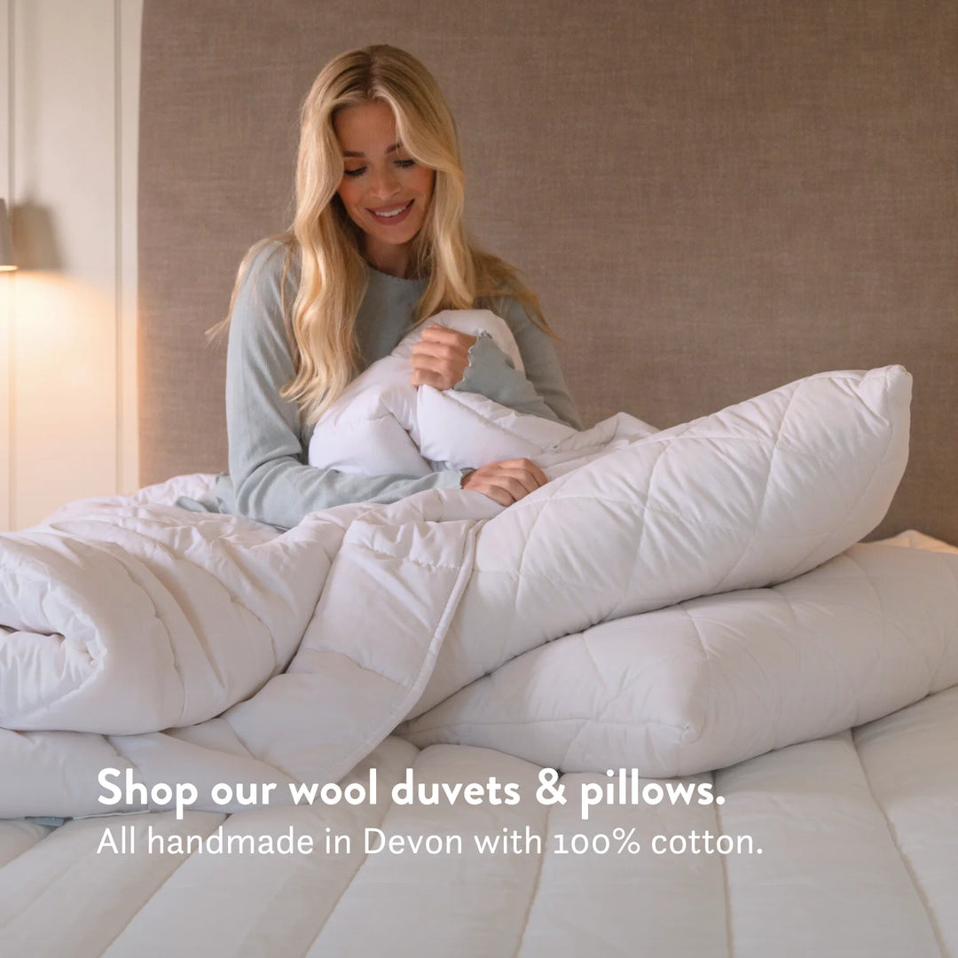 Shop our wool duvets & pillows. Natural 100% British Wool Mattress Topper thick handmade in the UK 100% cotton OEKO TEX Standard 100