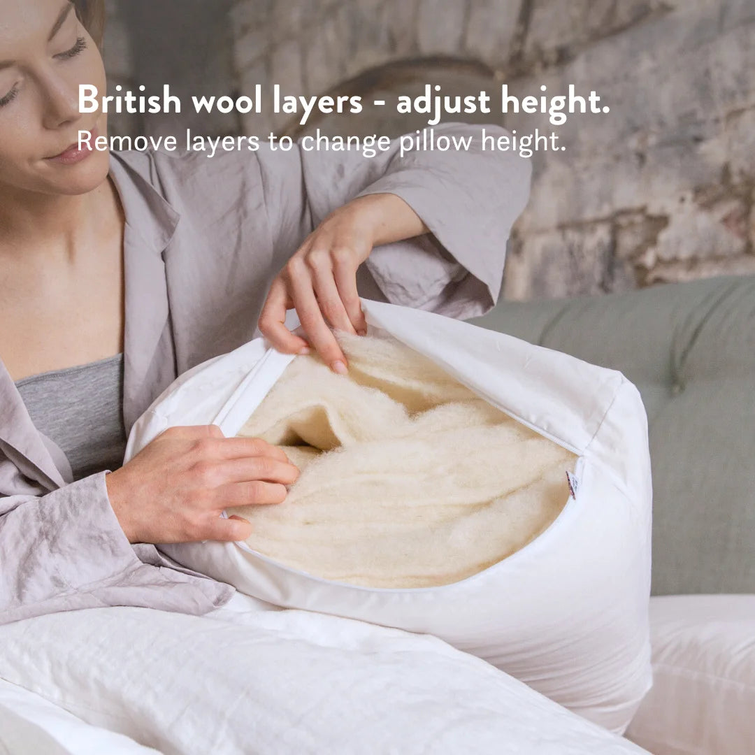 British wool height adjustable pillow with a 100% cotton cover. This pillow is hypoallergenic & anti-dust mite.